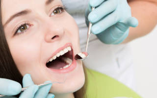 Профессиональная чистка зубов методом air flow
